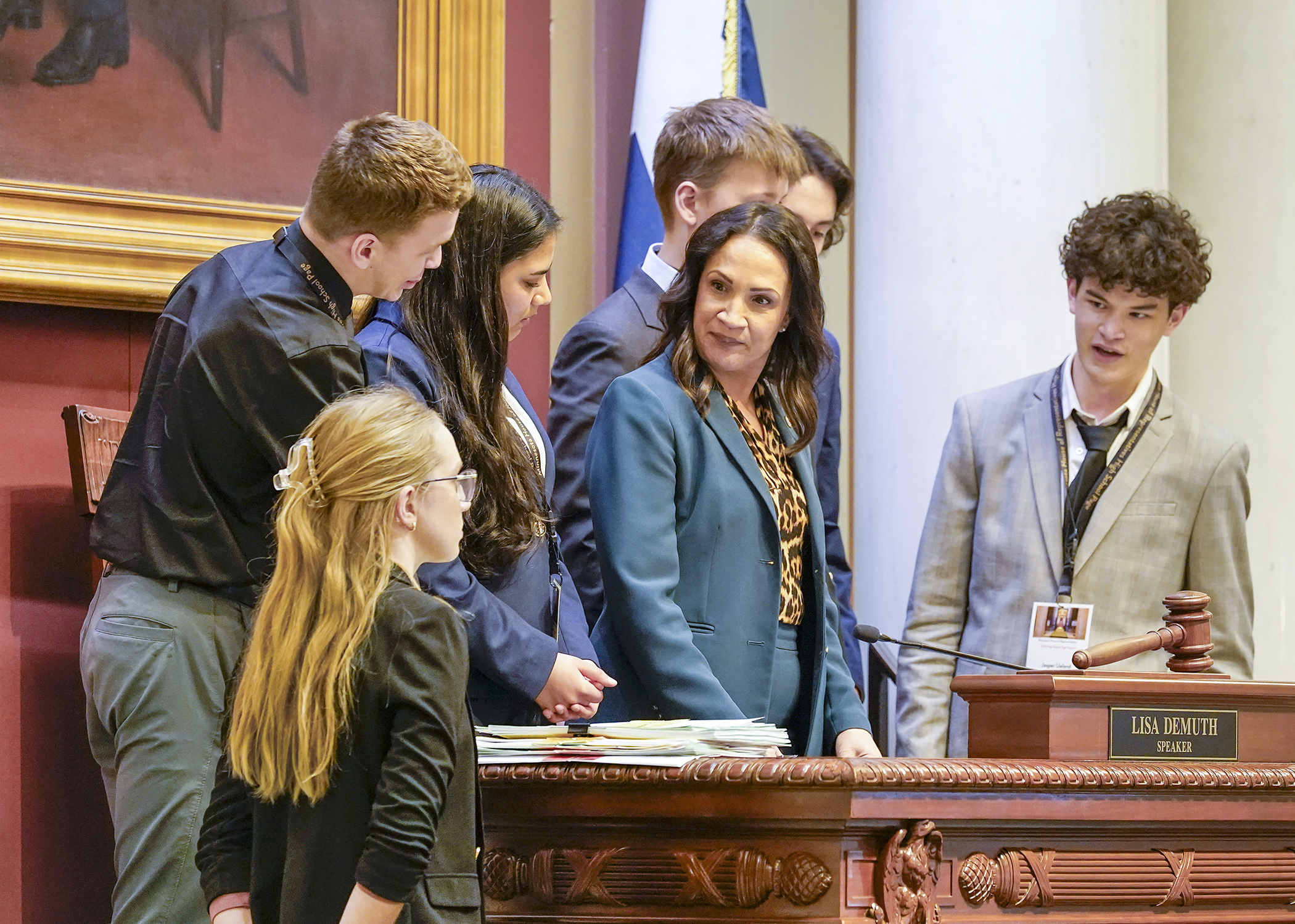 House Speaker Lisa Demuth visits with the week’s high school pages at the rostrum in the House Chamber April 9. (Photo by Andrew VonBank)